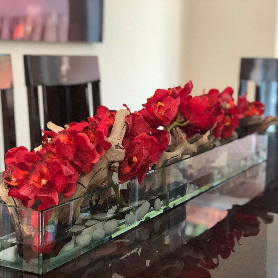 Maceta de vidrio moderna de 122 cm con cymbidiums rojos